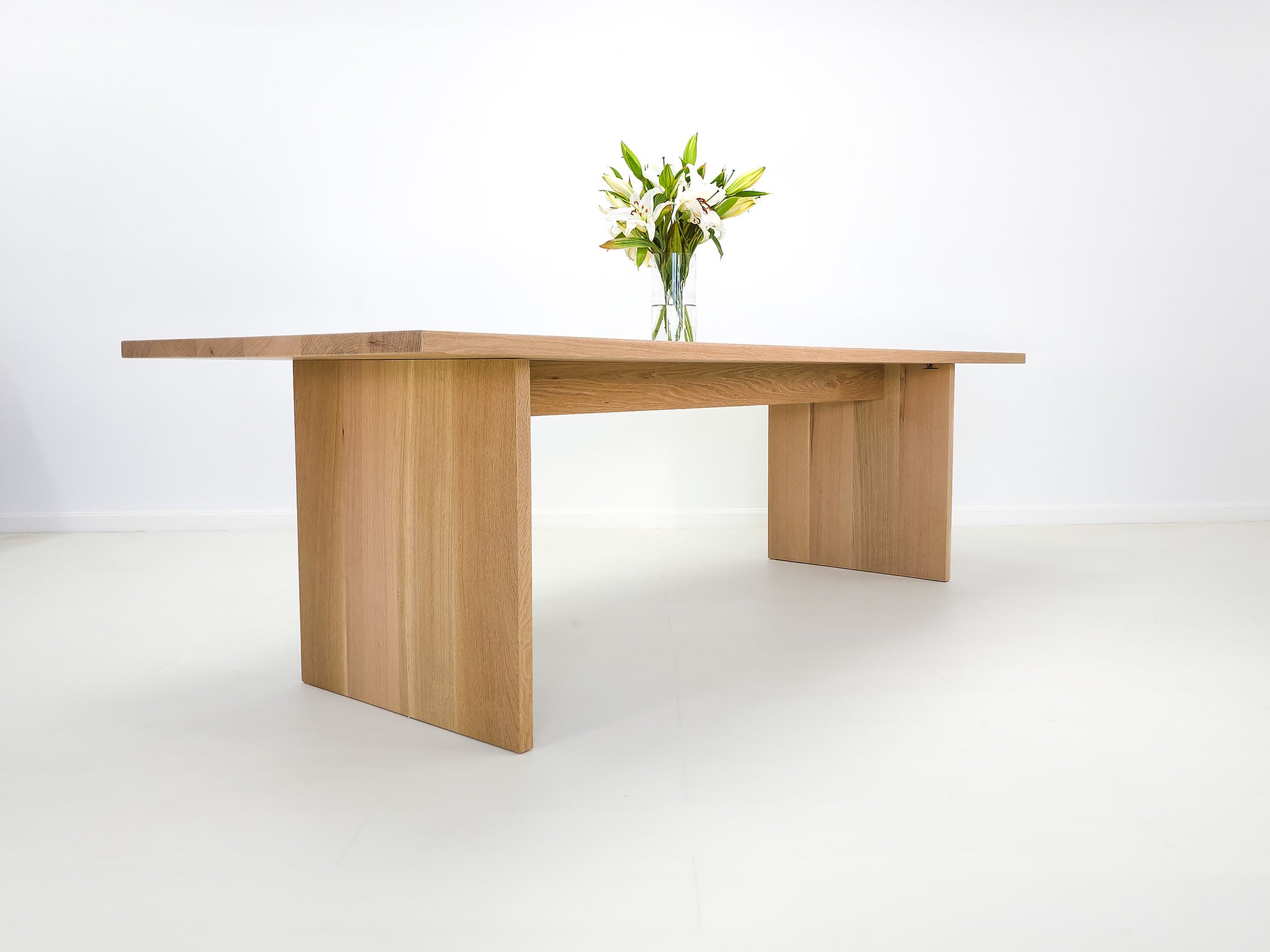 Lily dining table in natural white oak with thicker 1 3/8-inch solid wood top