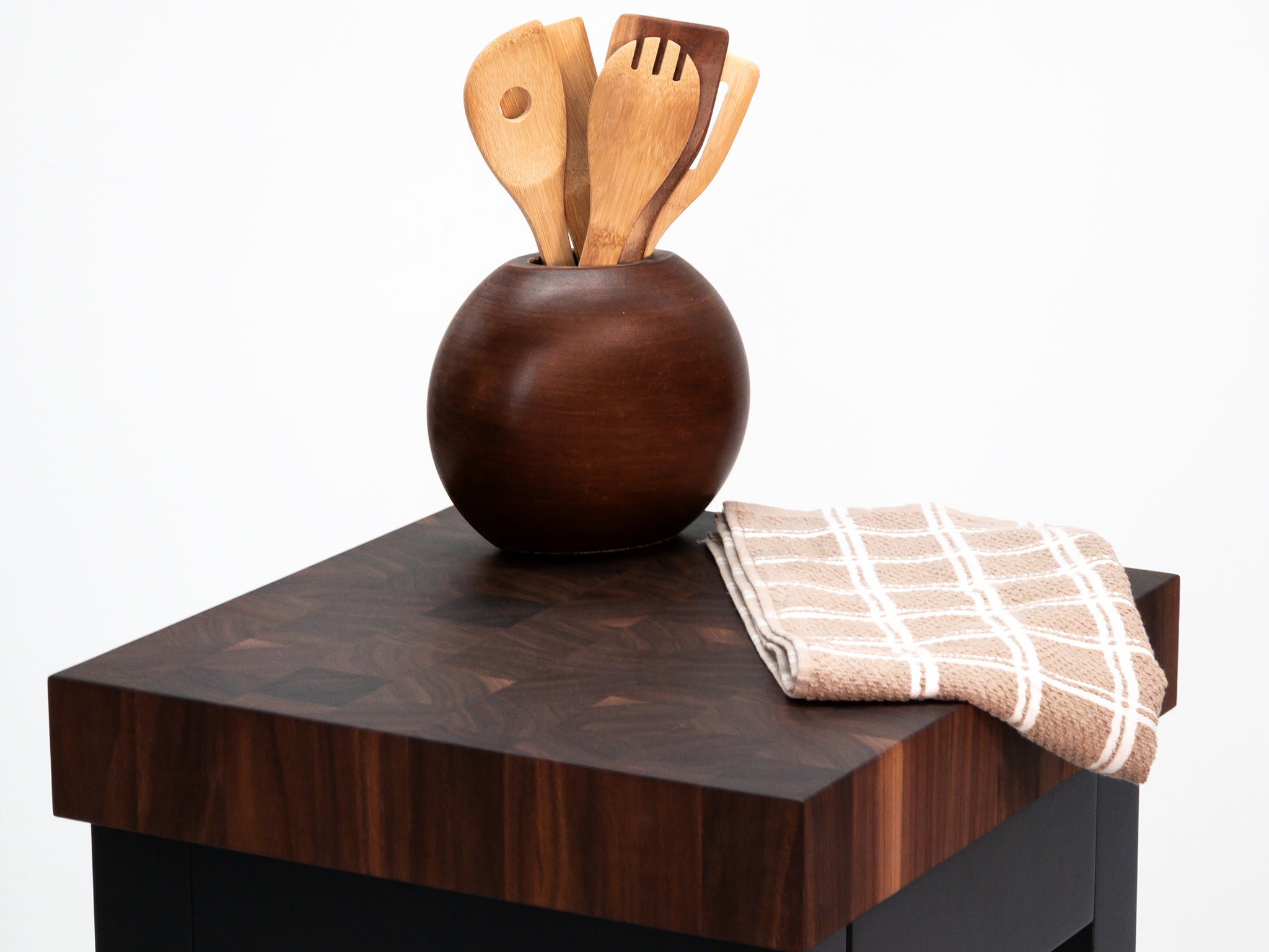 Custom LUCA island with painted base and slatted walnut shelf.