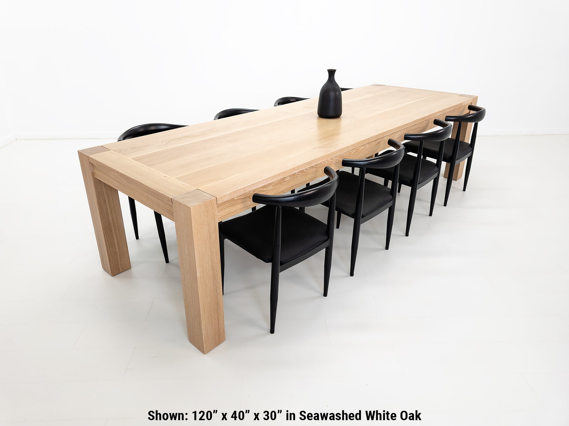 Custom JAQI table in seawashed white oak, Parsons-style base.
