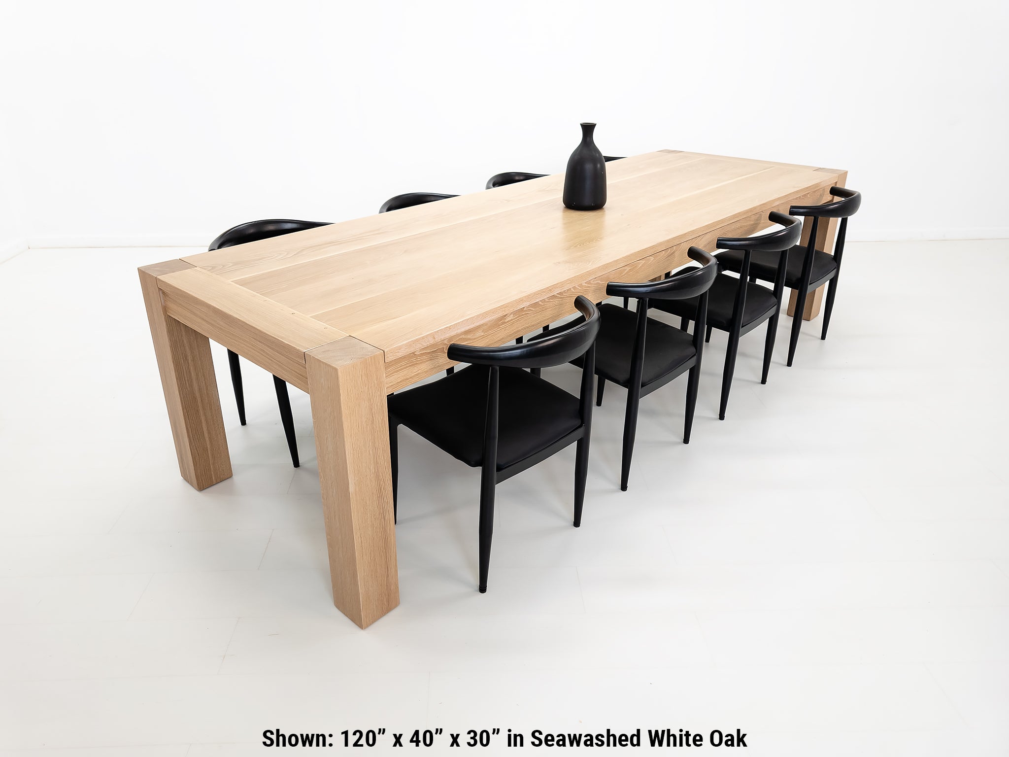 Custom JAQI table in seawashed white oak, Parsons-style base.