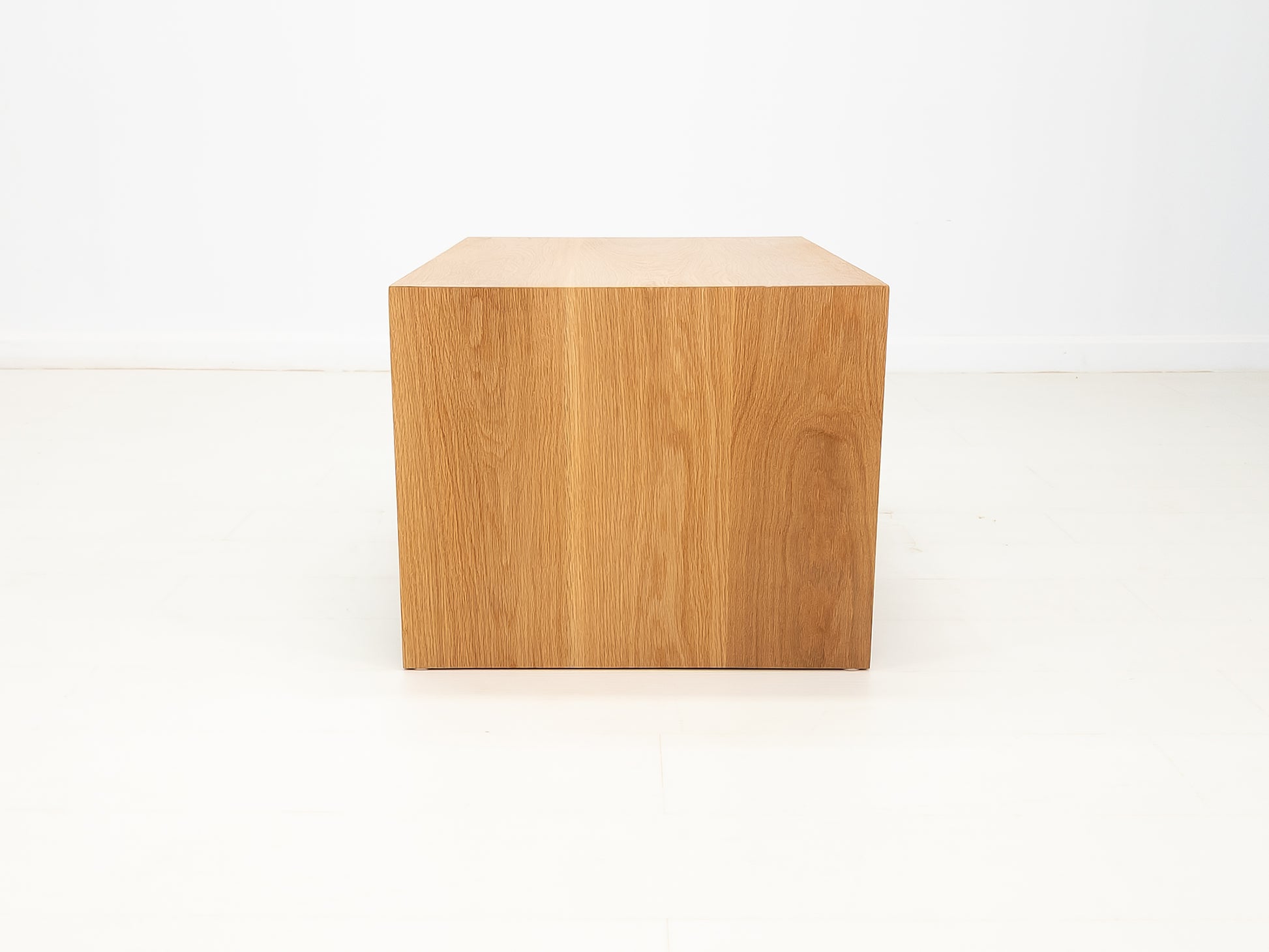 Overhead view of DREW coffee table highlighting wood grain and matte finish.