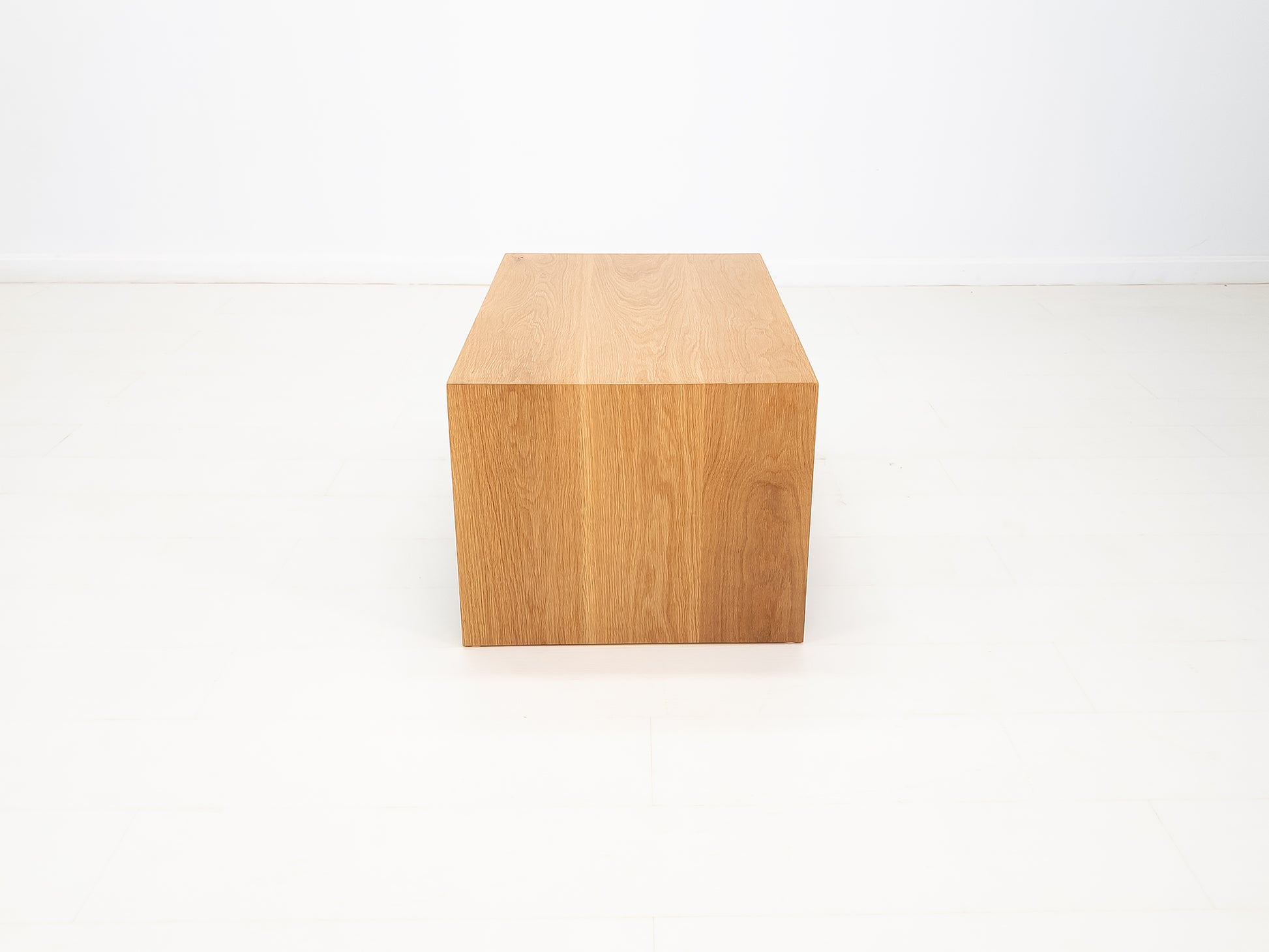 Overhead view of DREW coffee table highlighting wood grain and matte finish.