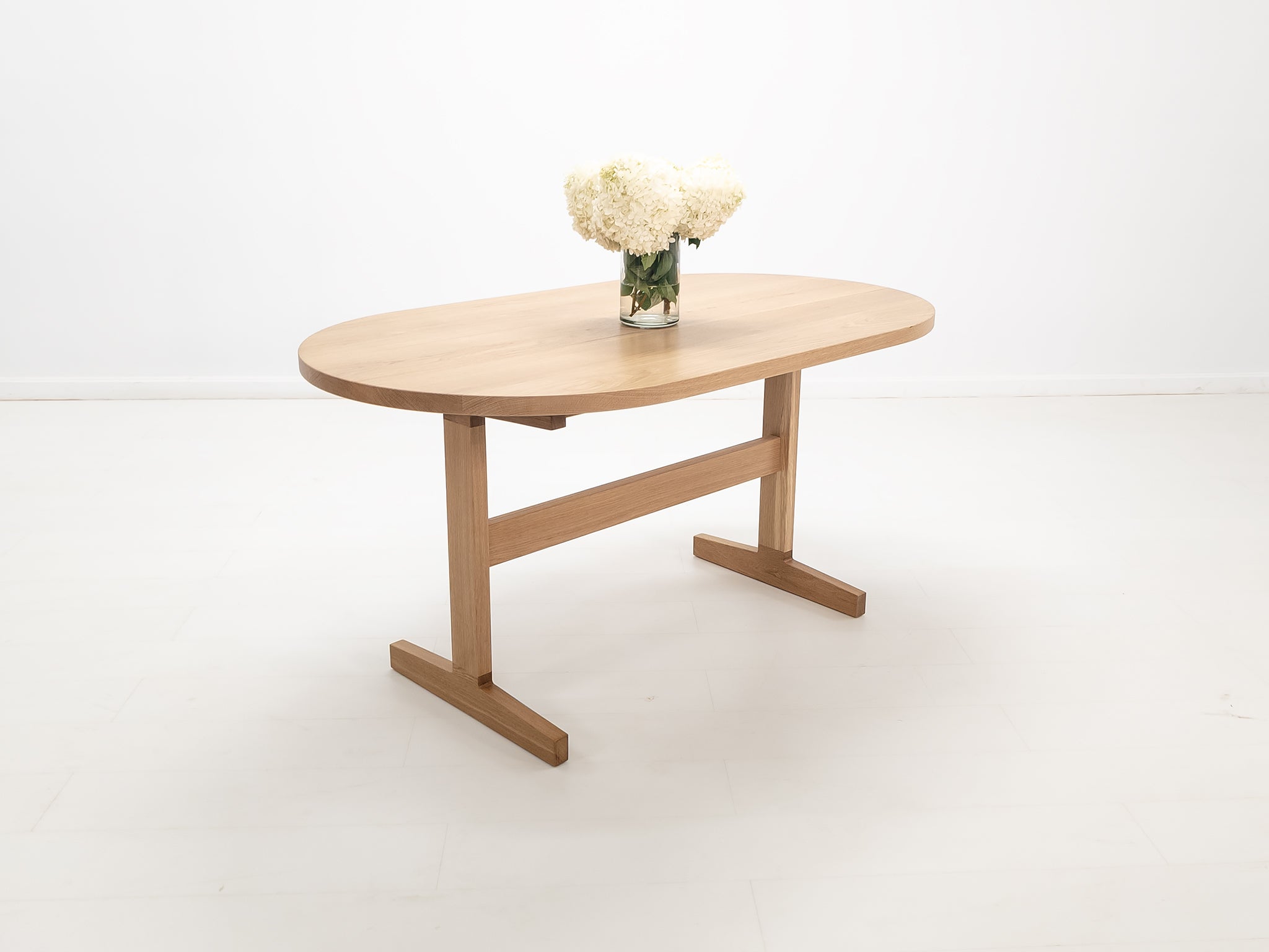 Heirloom-quality oak dining table handcrafted in Connecticut.