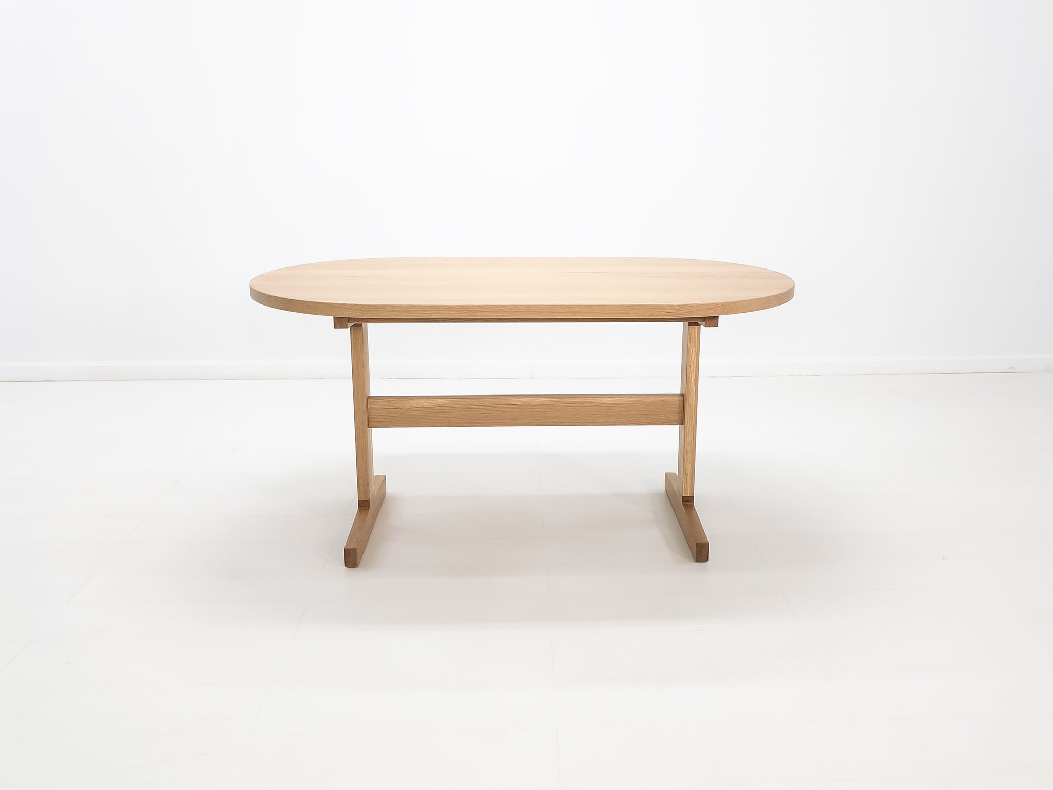 Heirloom-quality oak dining table handcrafted in Connecticut.