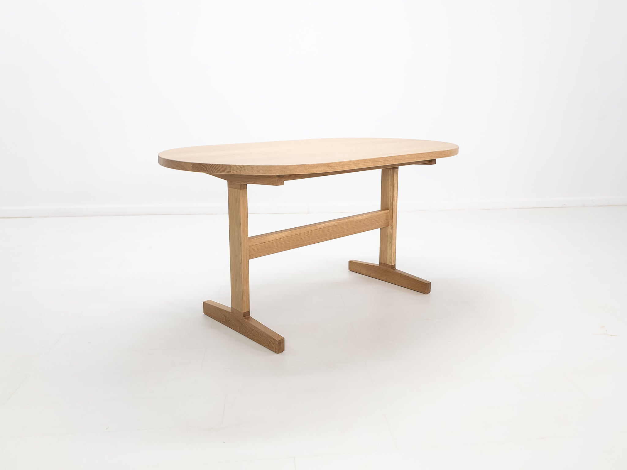 Heirloom-quality oak dining table handcrafted in Connecticut.