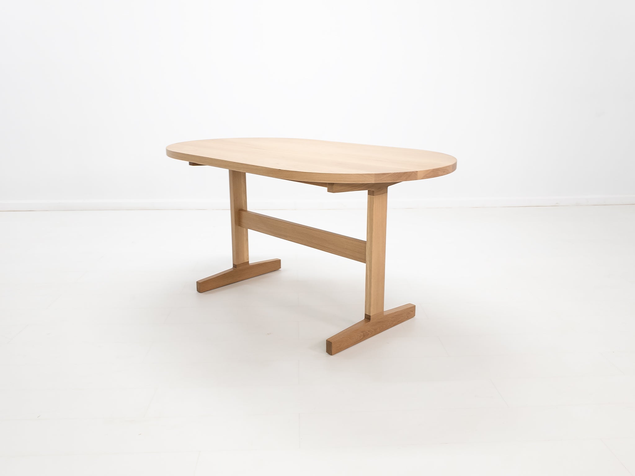 Heirloom-quality oak dining table handcrafted in Connecticut.