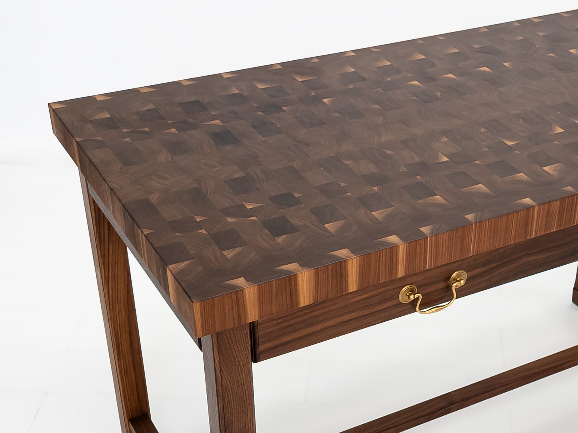 CAMI island with traditional brass pulls and handcrafted end-grain surface.