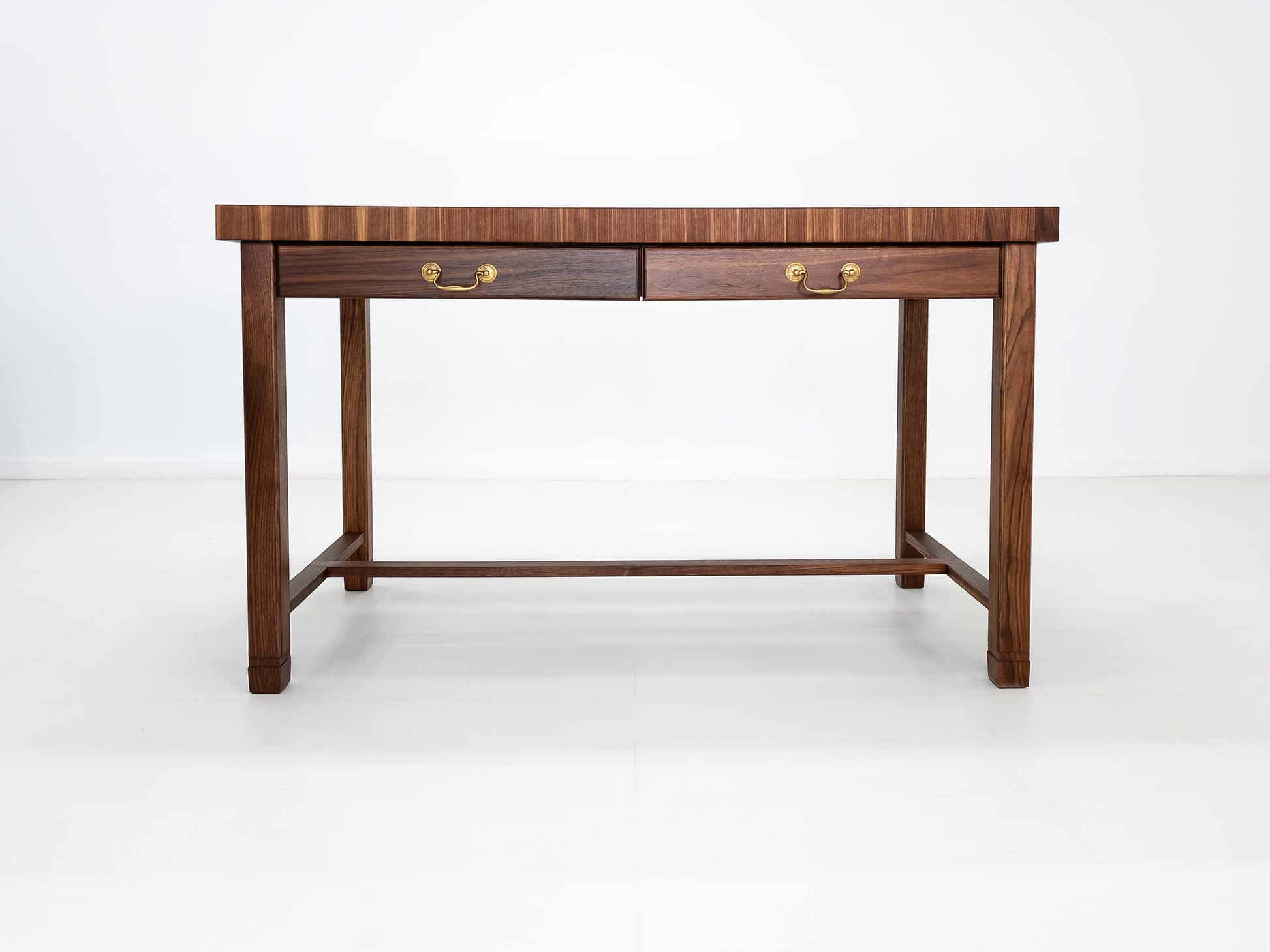 CAMI island with traditional brass pulls and handcrafted end-grain surface.