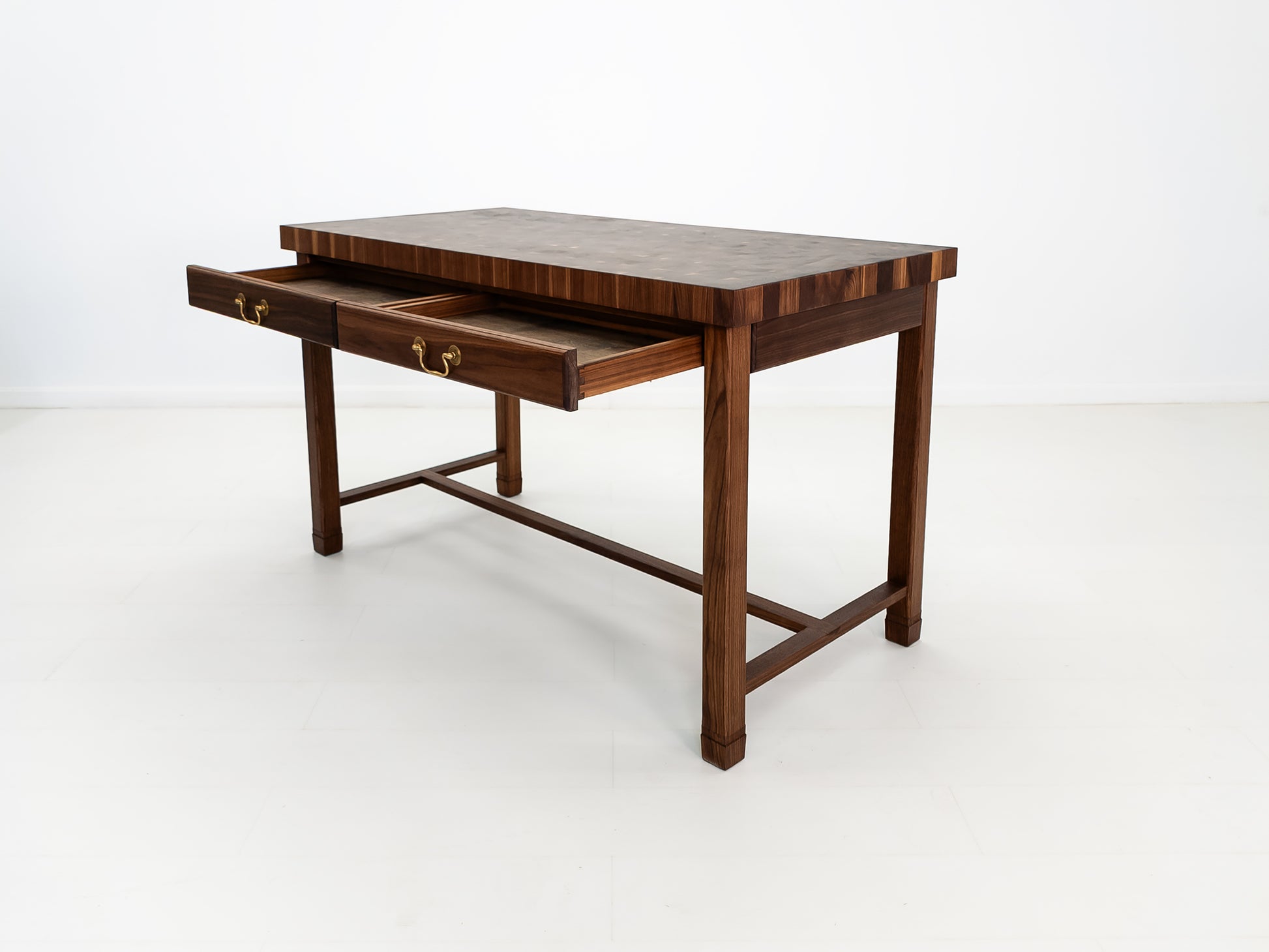 Walnut kitchen island with 2½-inch thick butcher block top and dual drawers