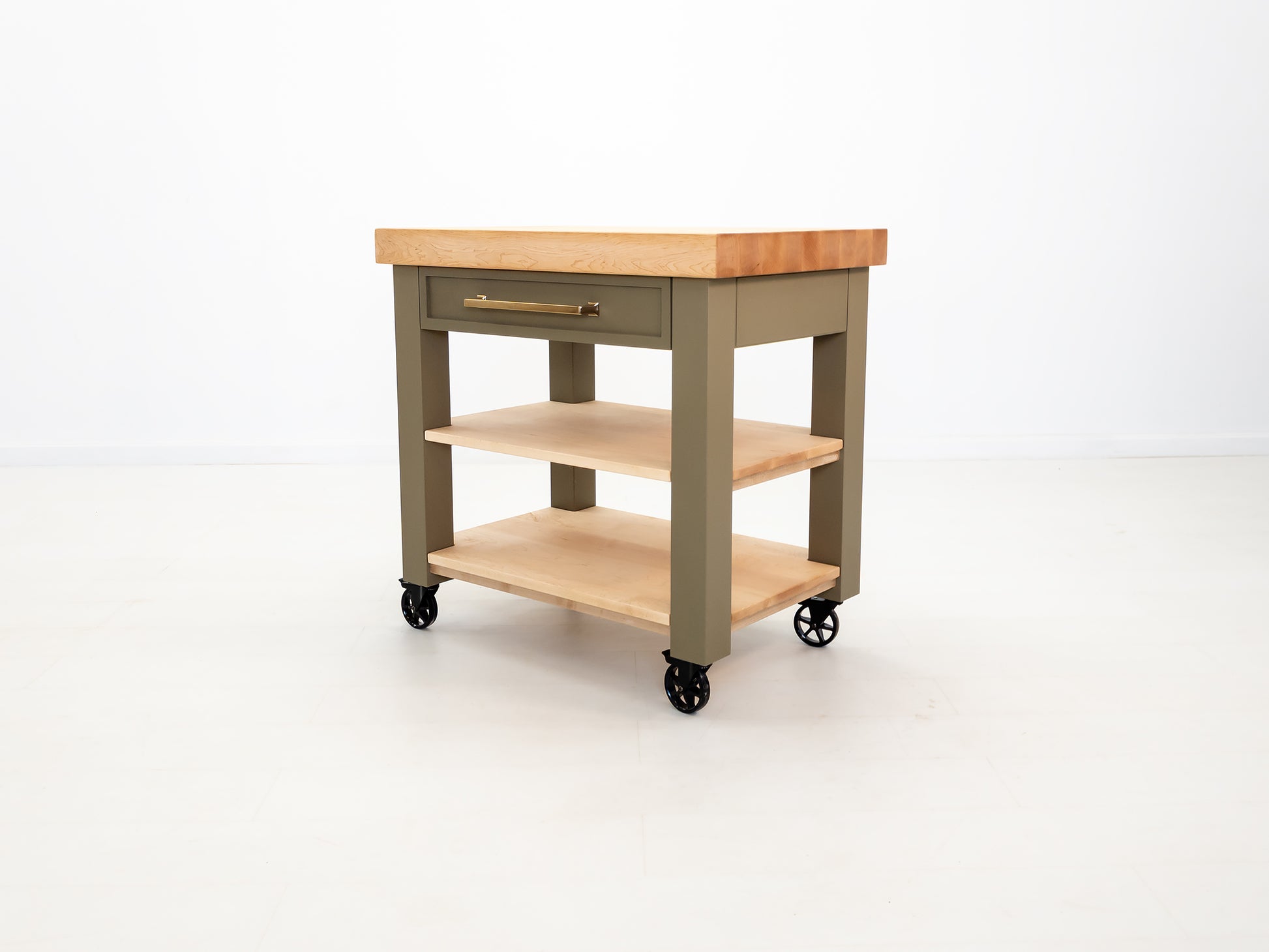 CHEF kitchen cart with solid wood top and utility storage.