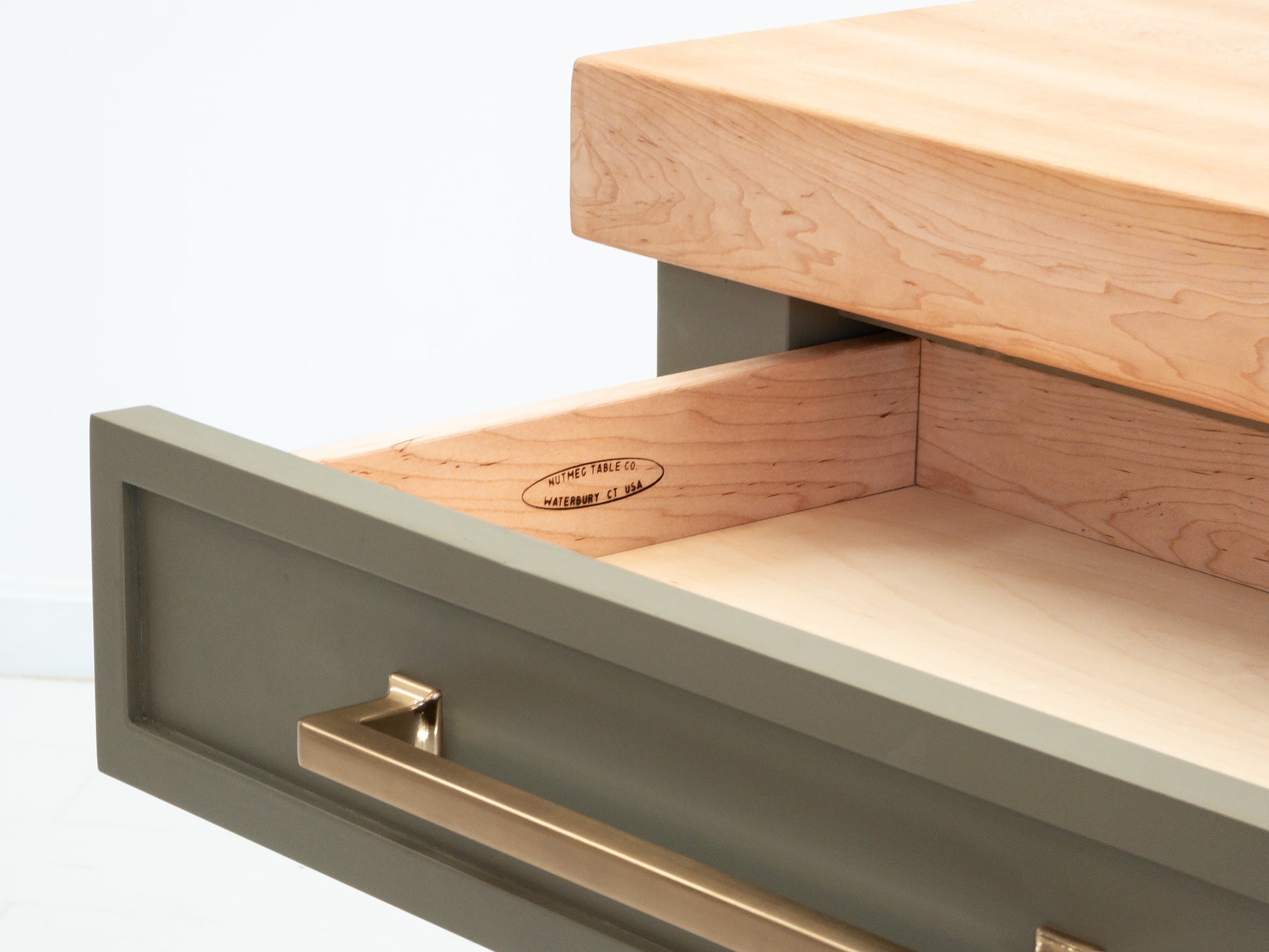 CHEF kitchen cart with solid wood top and utility storage.