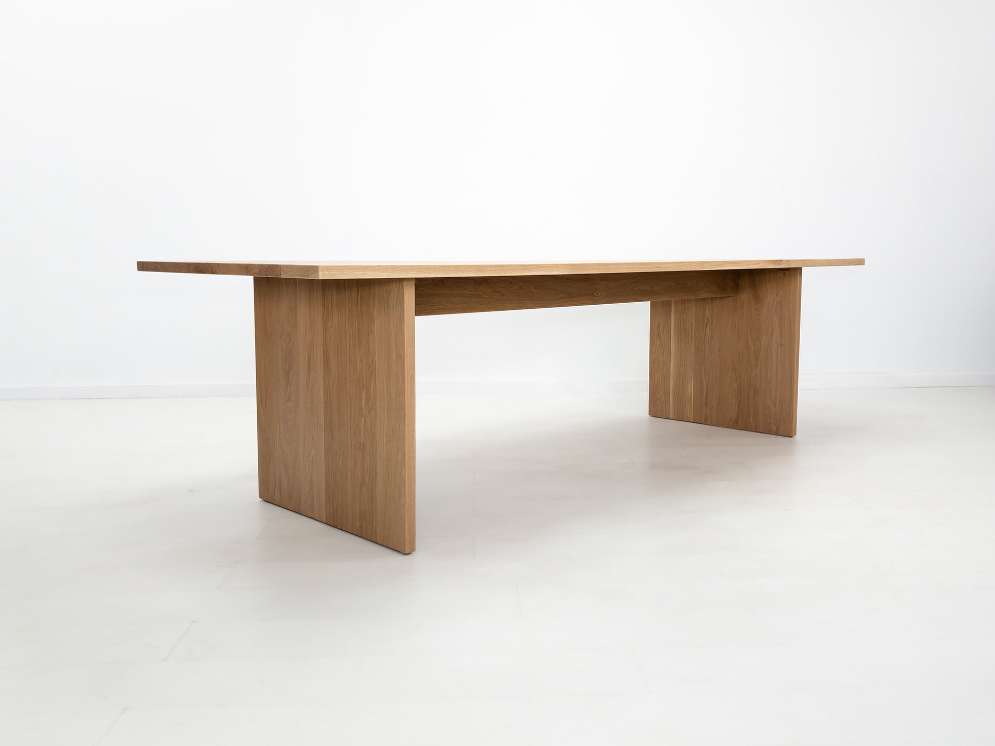 Lily dining table in natural white oak with thicker 1 3/8-inch solid wood top