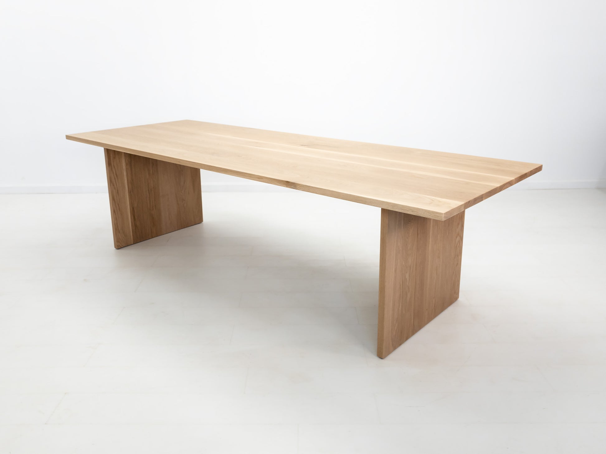 Lily dining table in natural white oak with thicker 1 3/8-inch solid wood top