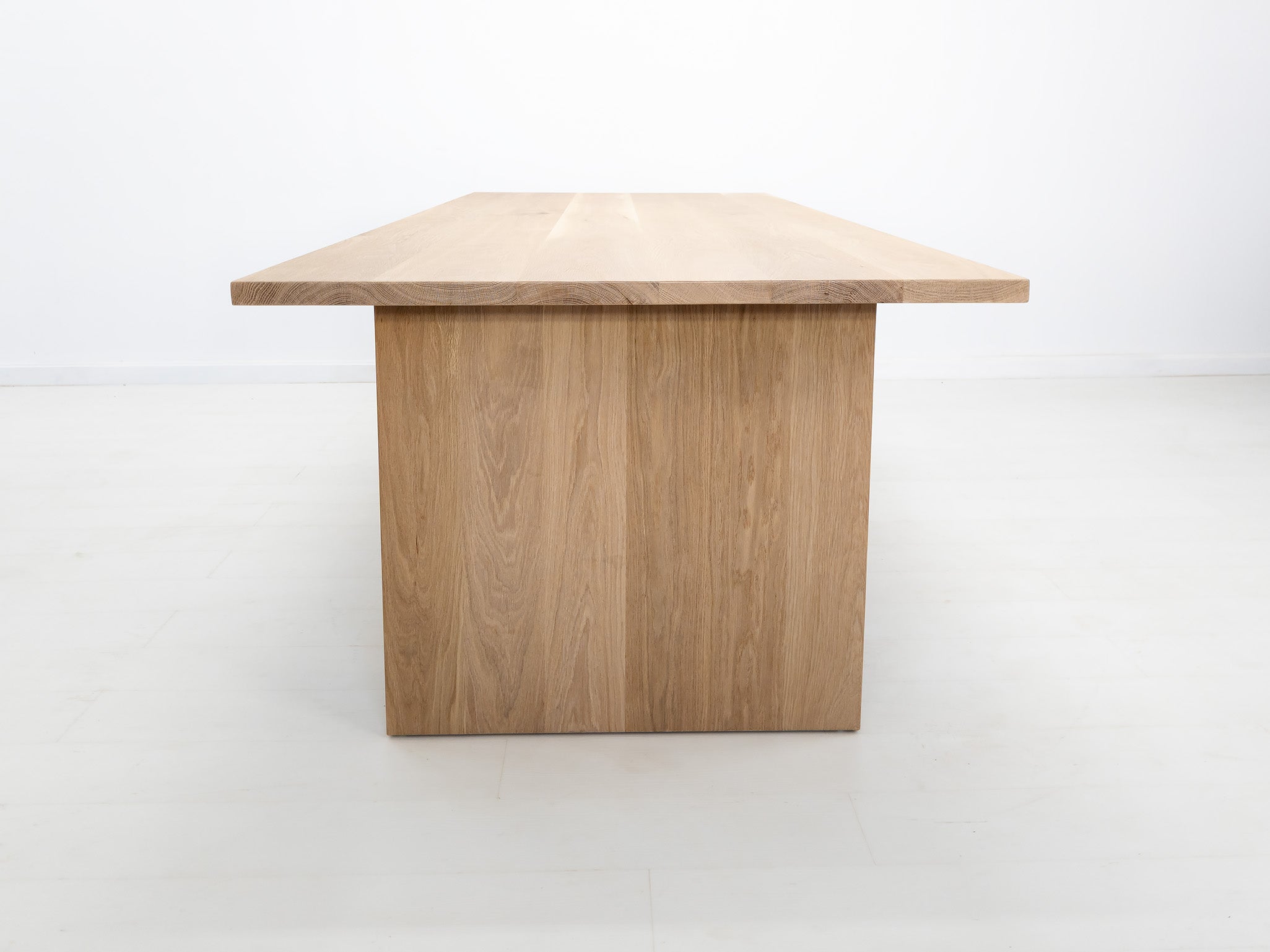 Lily dining table in natural white oak with thicker 1 3/8-inch solid wood top
