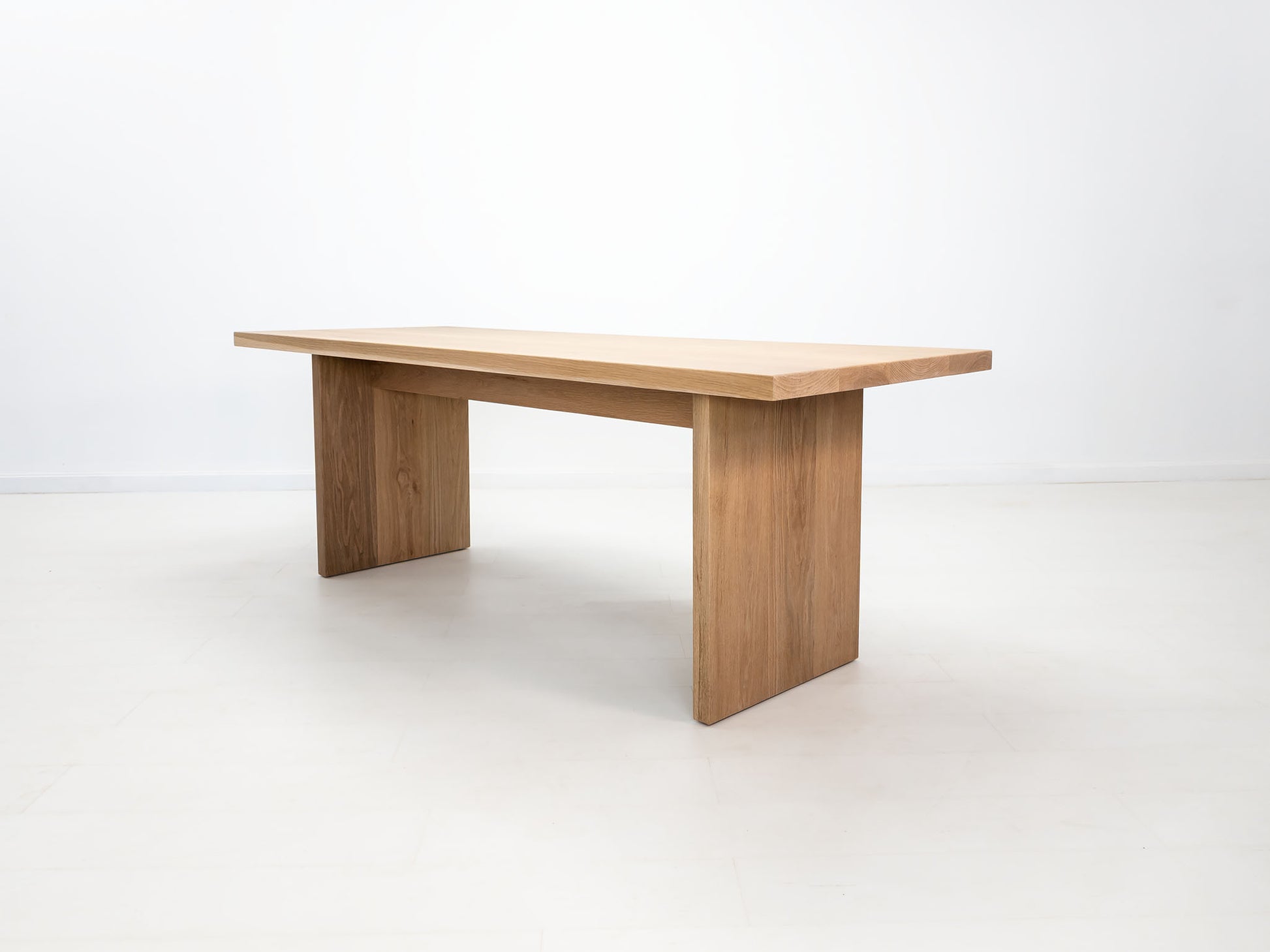 Solid white oak dining table with seamless plank top – handcrafted in Connecticut