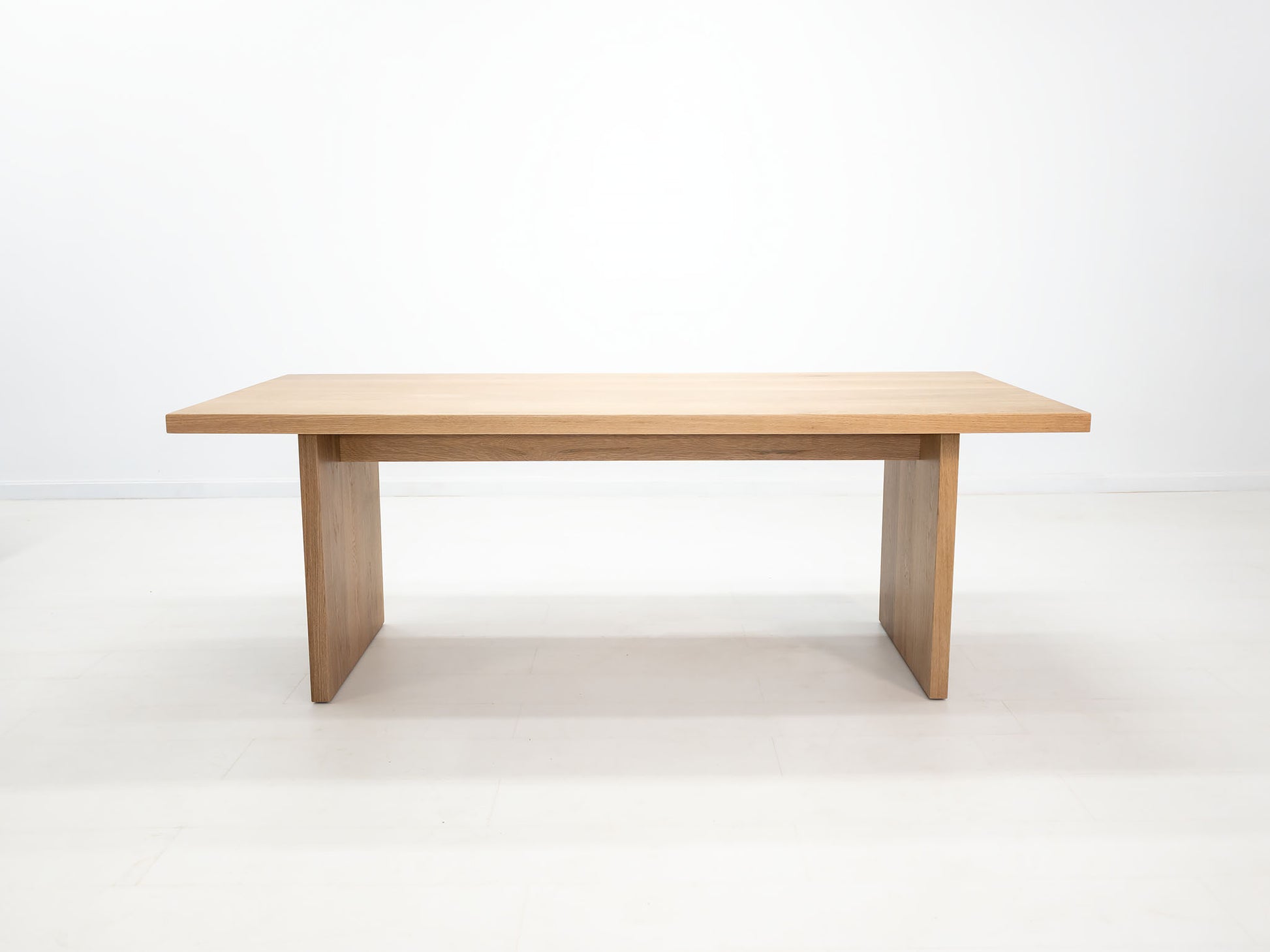 Solid white oak dining table with seamless plank top – handcrafted in Connecticut