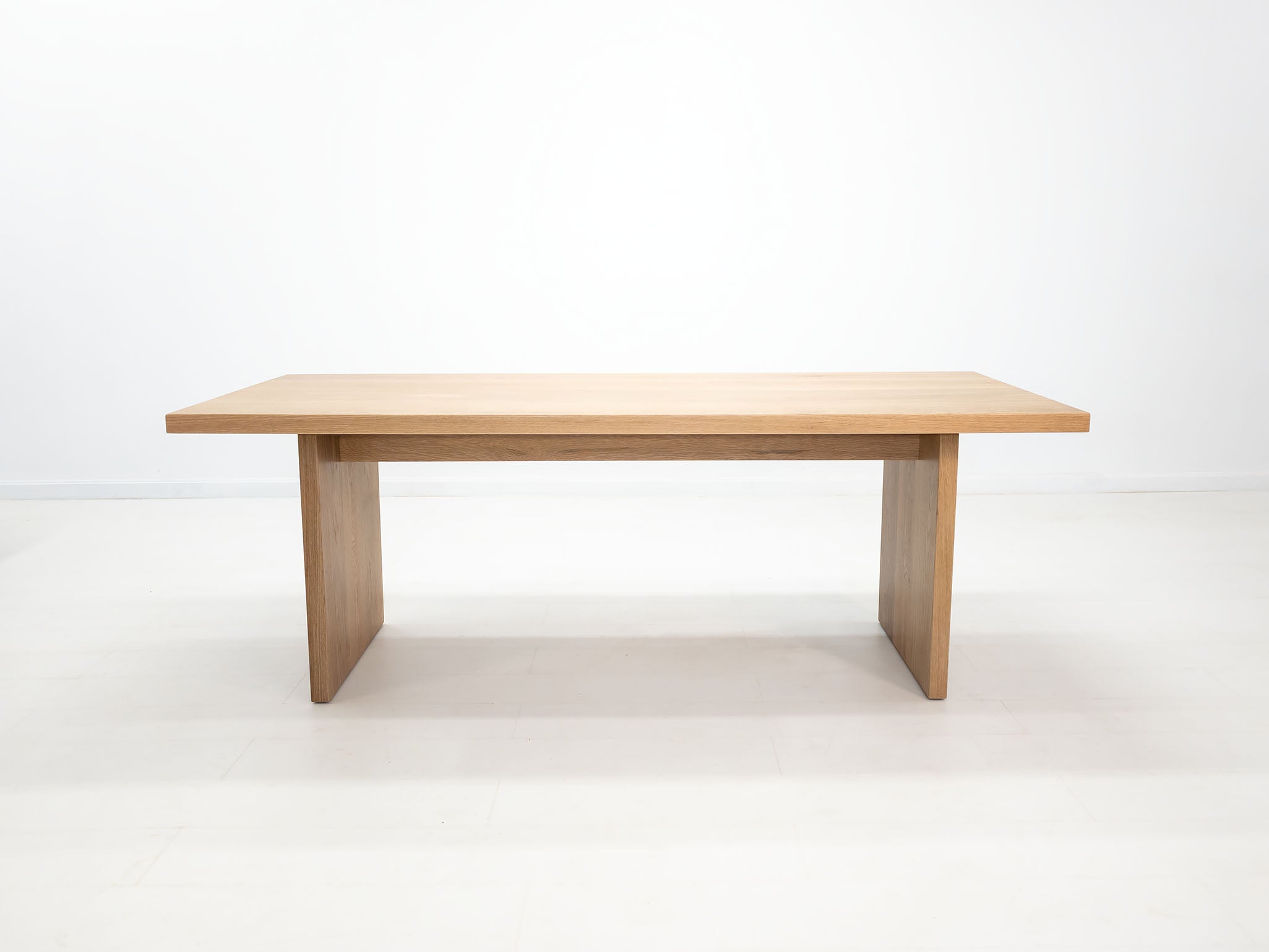 Solid white oak dining table with seamless plank top – handcrafted in Connecticut