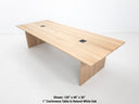 Lily dining table in natural white oak with 1-inch thick top and clean plank grain.