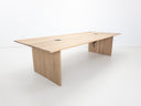 Lily dining table in natural white oak with 1-inch thick top and clean plank grain.