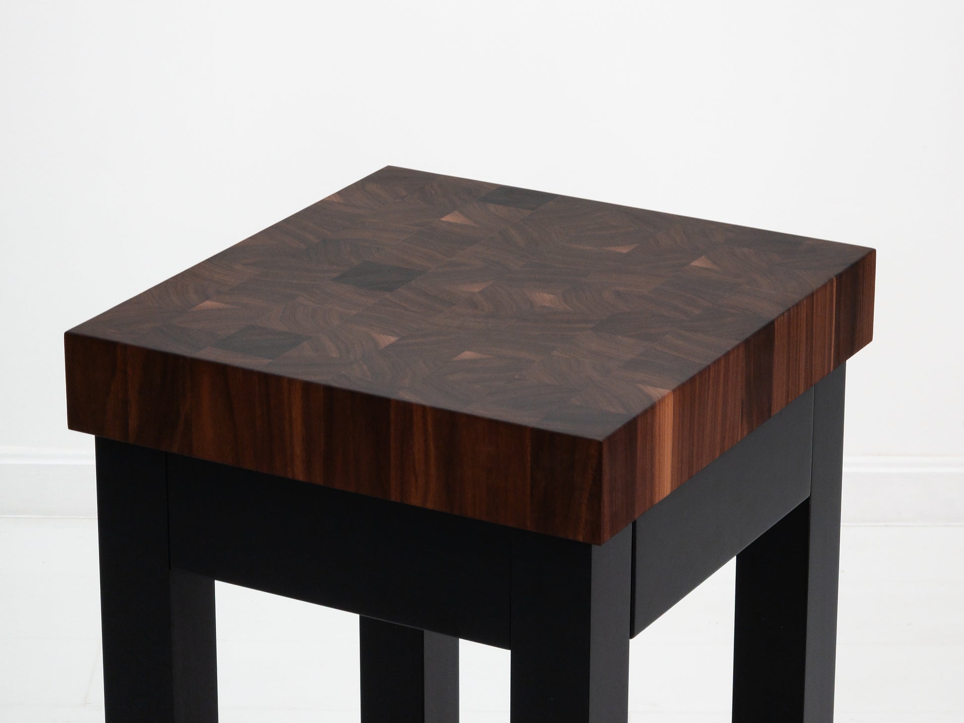 Custom LUCA island with painted base and slatted walnut shelf.