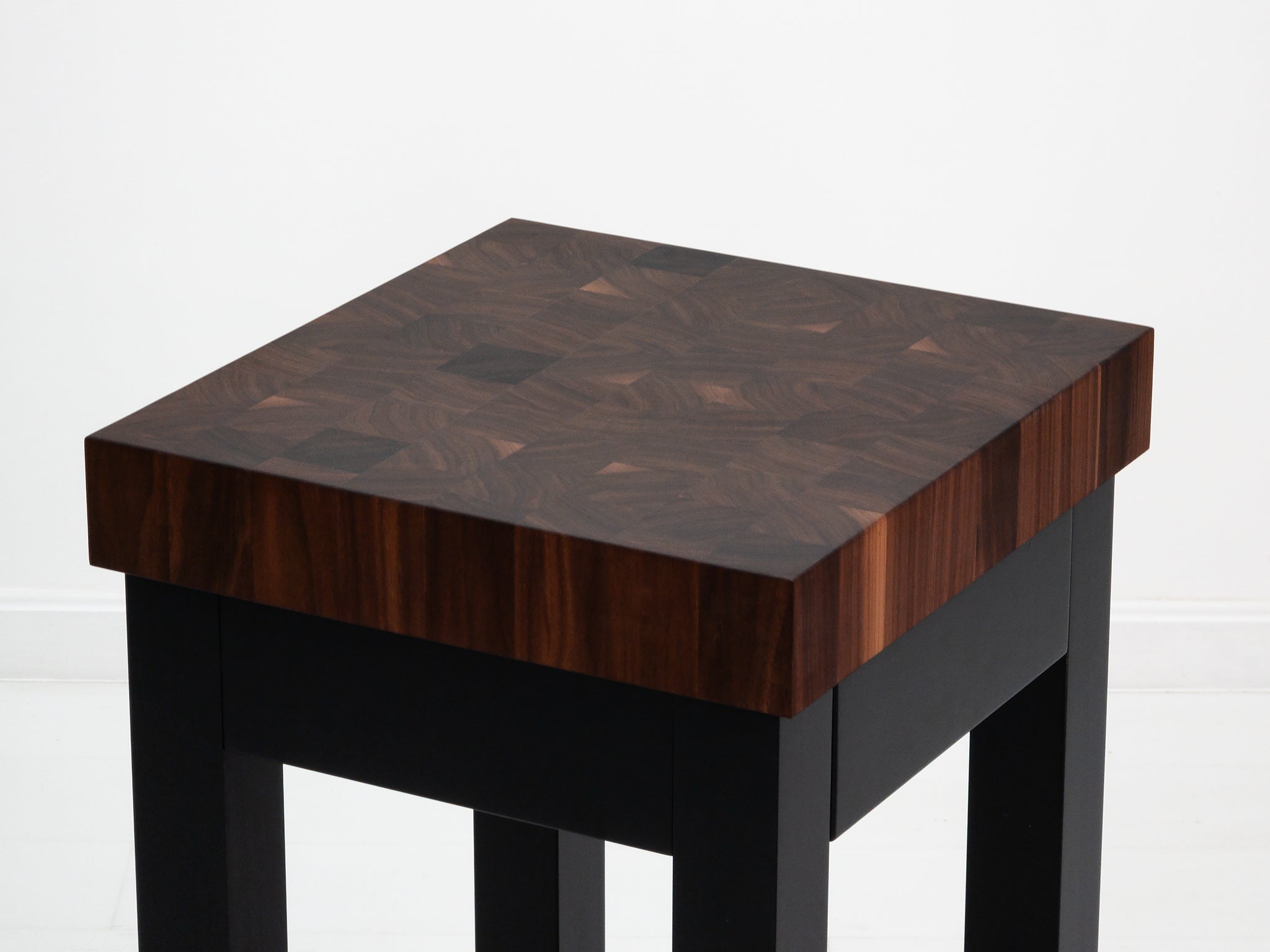 Custom LUCA island with painted base and slatted walnut shelf.