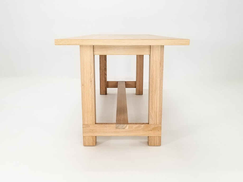 Rémy dining table in seawashed white oak with a clear matte finish.