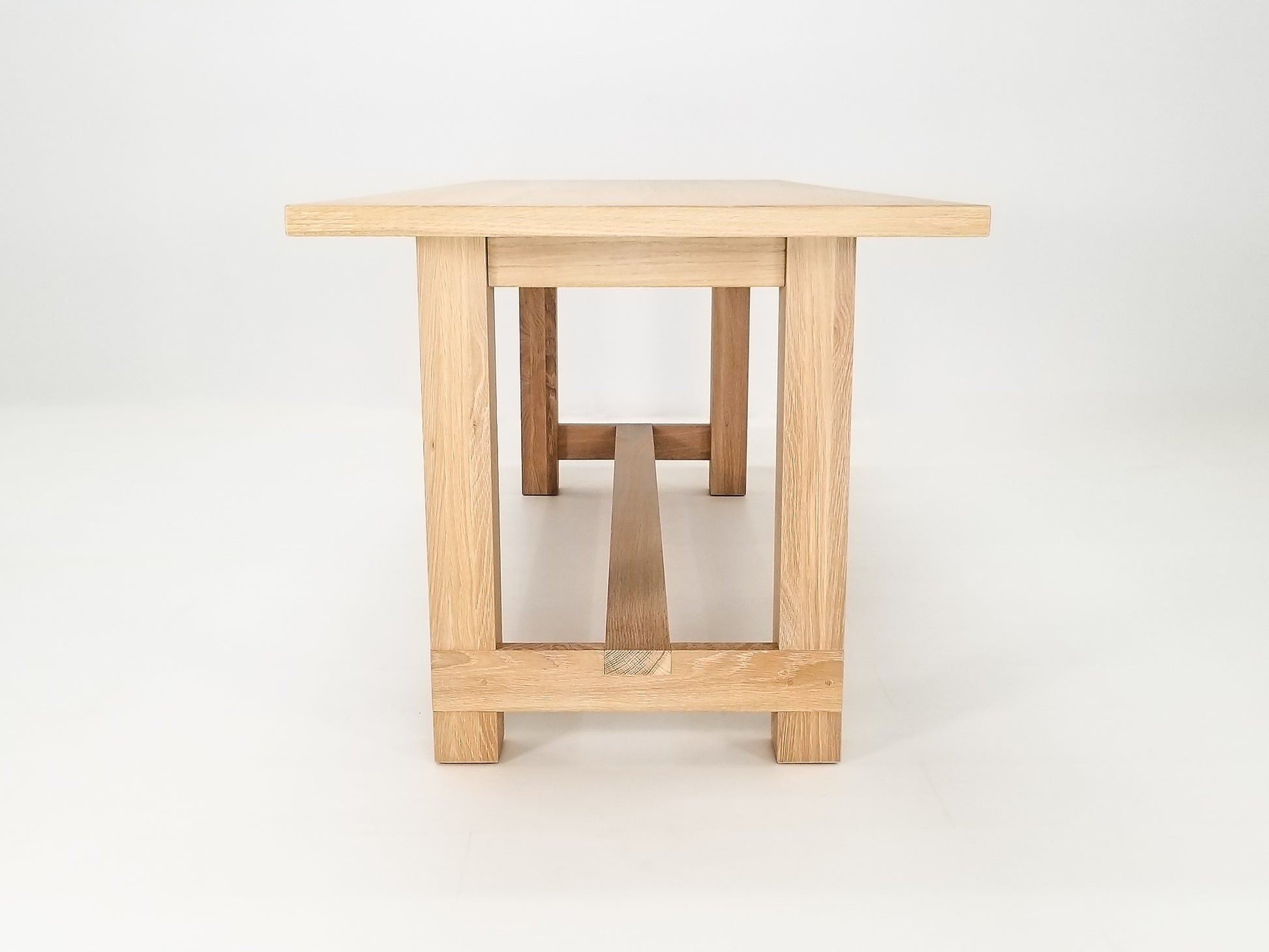 Rémy dining table in seawashed white oak with a clear matte finish.