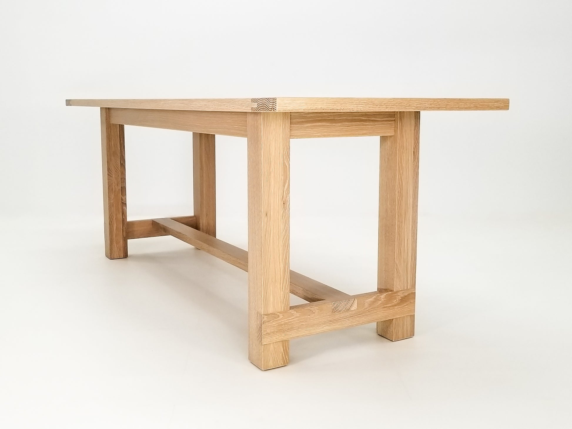 Rémy dining table in seawashed white oak with a clear matte finish.