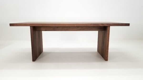 A 2" thick walnut dining table.