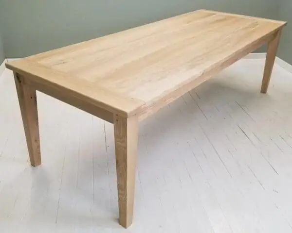 A tapered leg dining table.