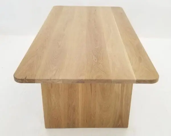 A TIAN Dining Table with Rounded Corners on a white background.