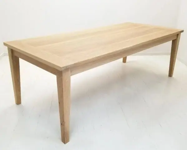 A tapered leg dining table.