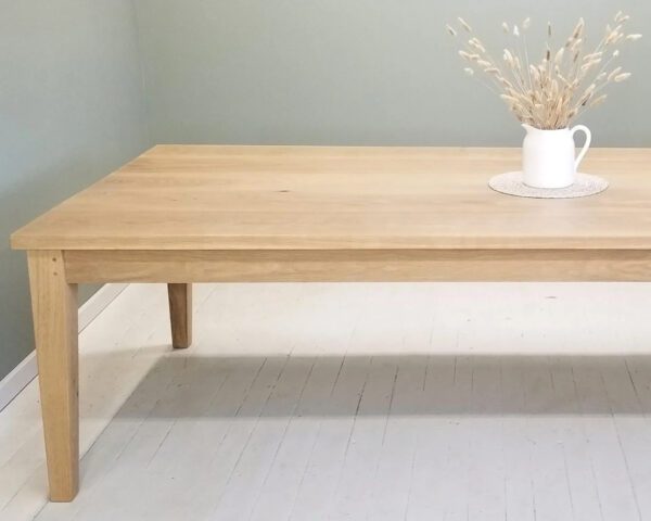 A tapered leg dining table.