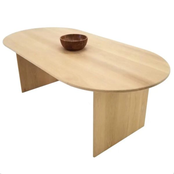 A wooden dining table with no one around it.
