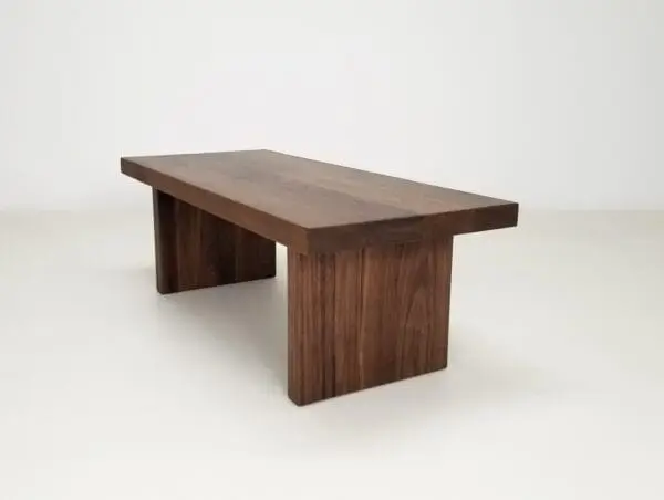 A wooden panel coffee table.