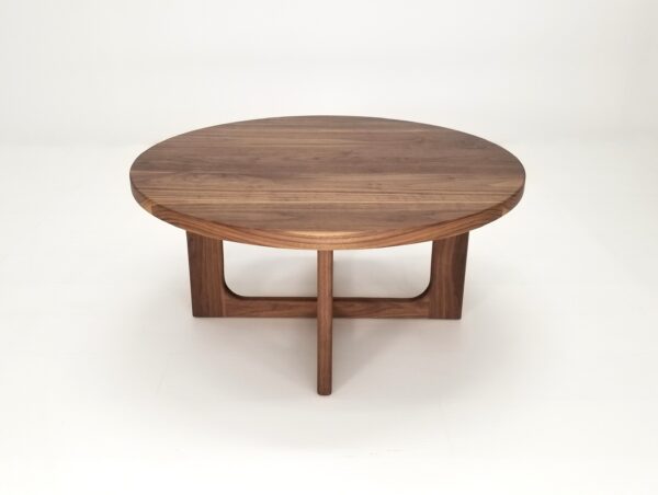 A CARY Round Cross Leg Coffee Table.