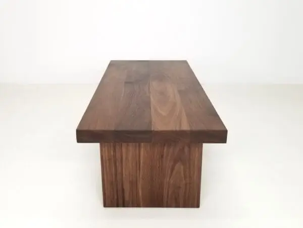 A wooden panel coffee table.