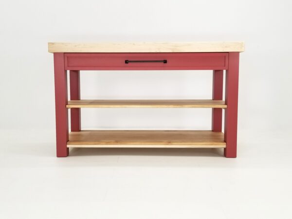 A red kitchen table with a wooden shelf and a CHEF Custom Maple Butcher Block Cart.