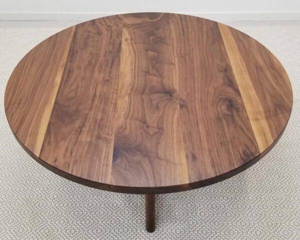A CARY Round Cross Leg Coffee Table.