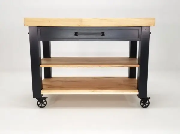 A wooden-top CHEF Custom Maple Butcher Block Cart on wheels, also known as a butcher block cart.