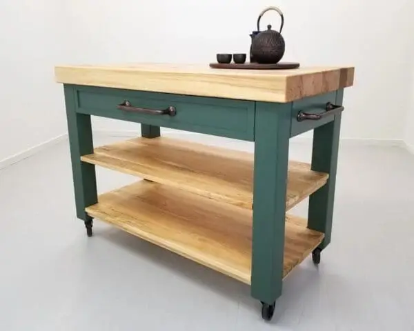 A butcher block cart in forest green.