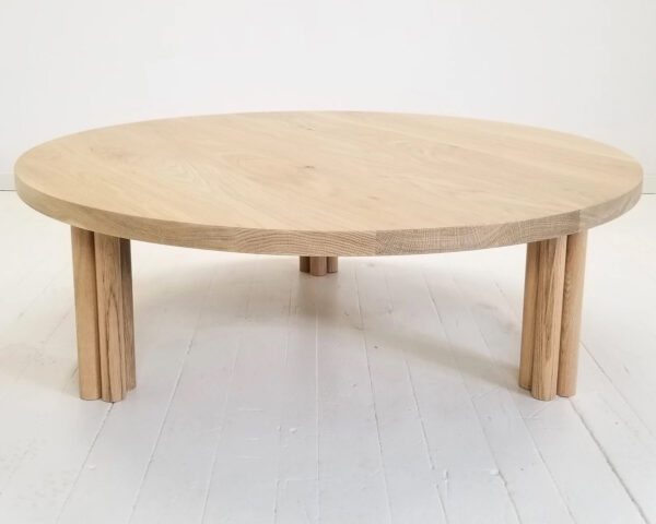 Our white oak BEAU coffee table with cylinder legs.