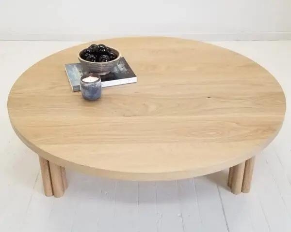 Our white oak BEAU coffee table with cylinder legs.