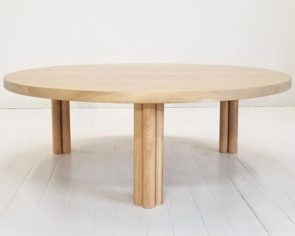 Our white oak BEAU coffee table with cylinder legs.