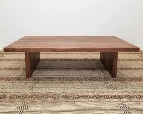A wooden panel coffee table.