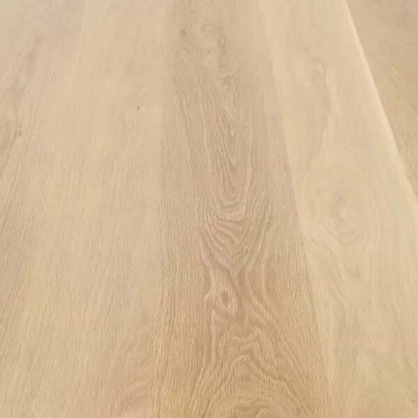 A close up of a white Wood & Finish Options table with a smooth finish.