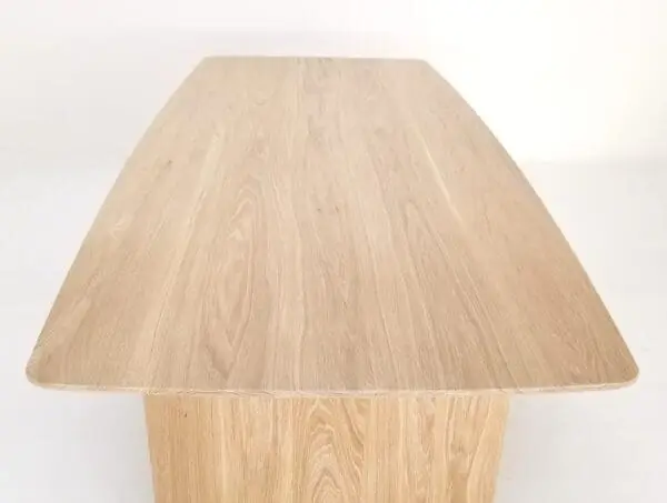 A white oak table with a beveled edge.