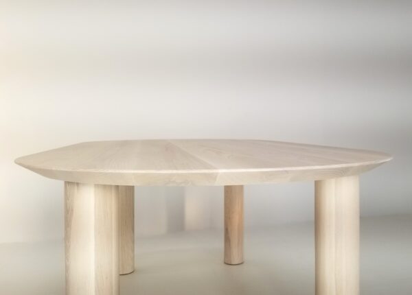 A close up of the under-bevel edge on our COVE dining table in sunwashed ash.