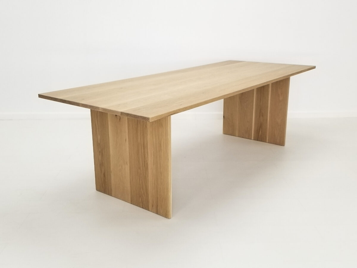 LILY 1 inch dining table in natural white oak with seamless plank top and adjustable leg placement