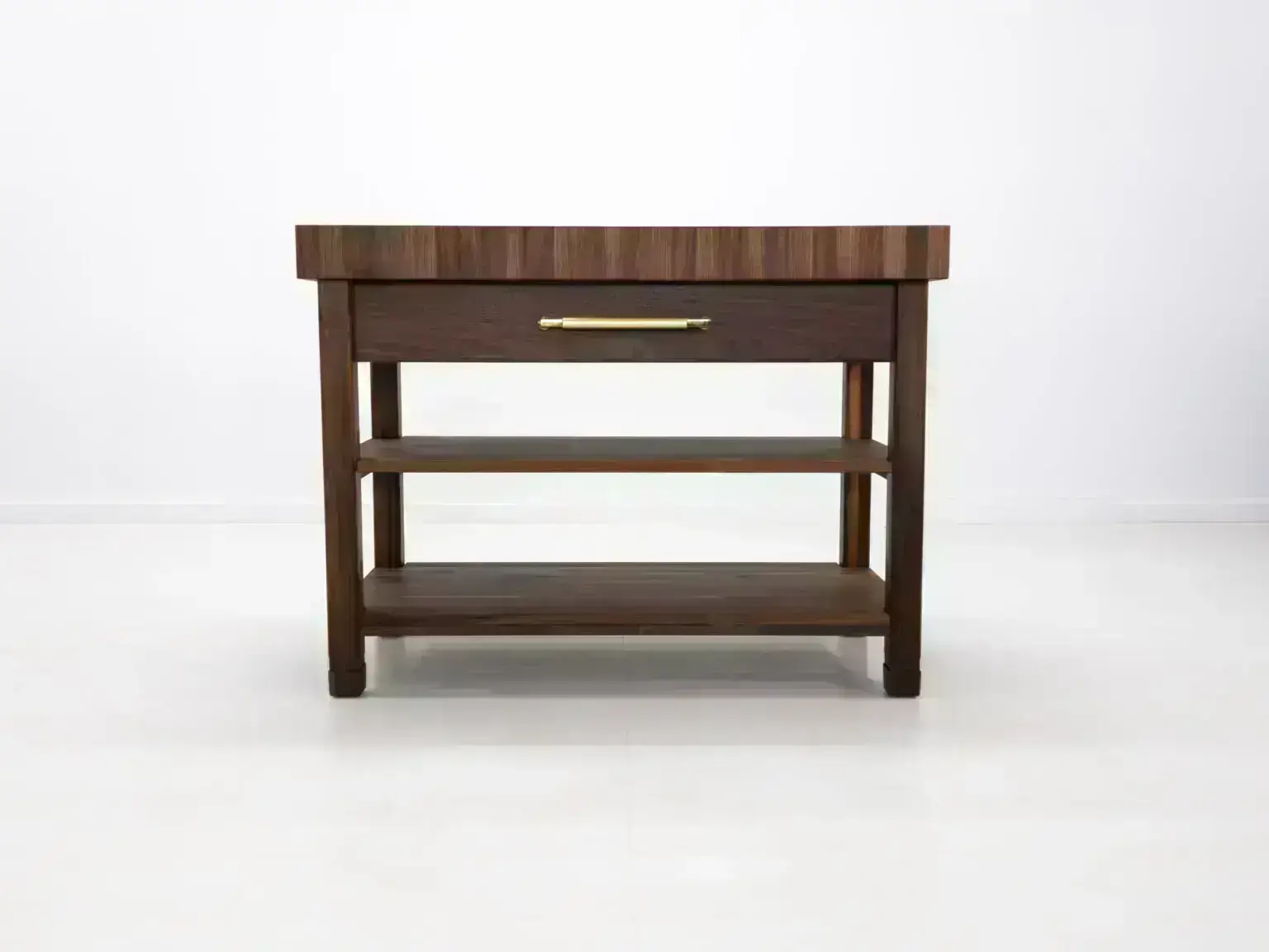 Custom WALT butcher block kitchen island with 4 inch thick walnut top